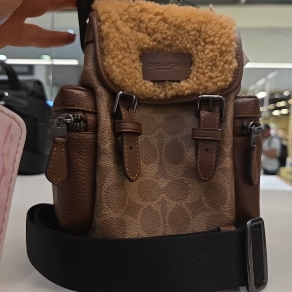 Coach Handbags - Coach Brown and Tan Shearling Crossbody Bag